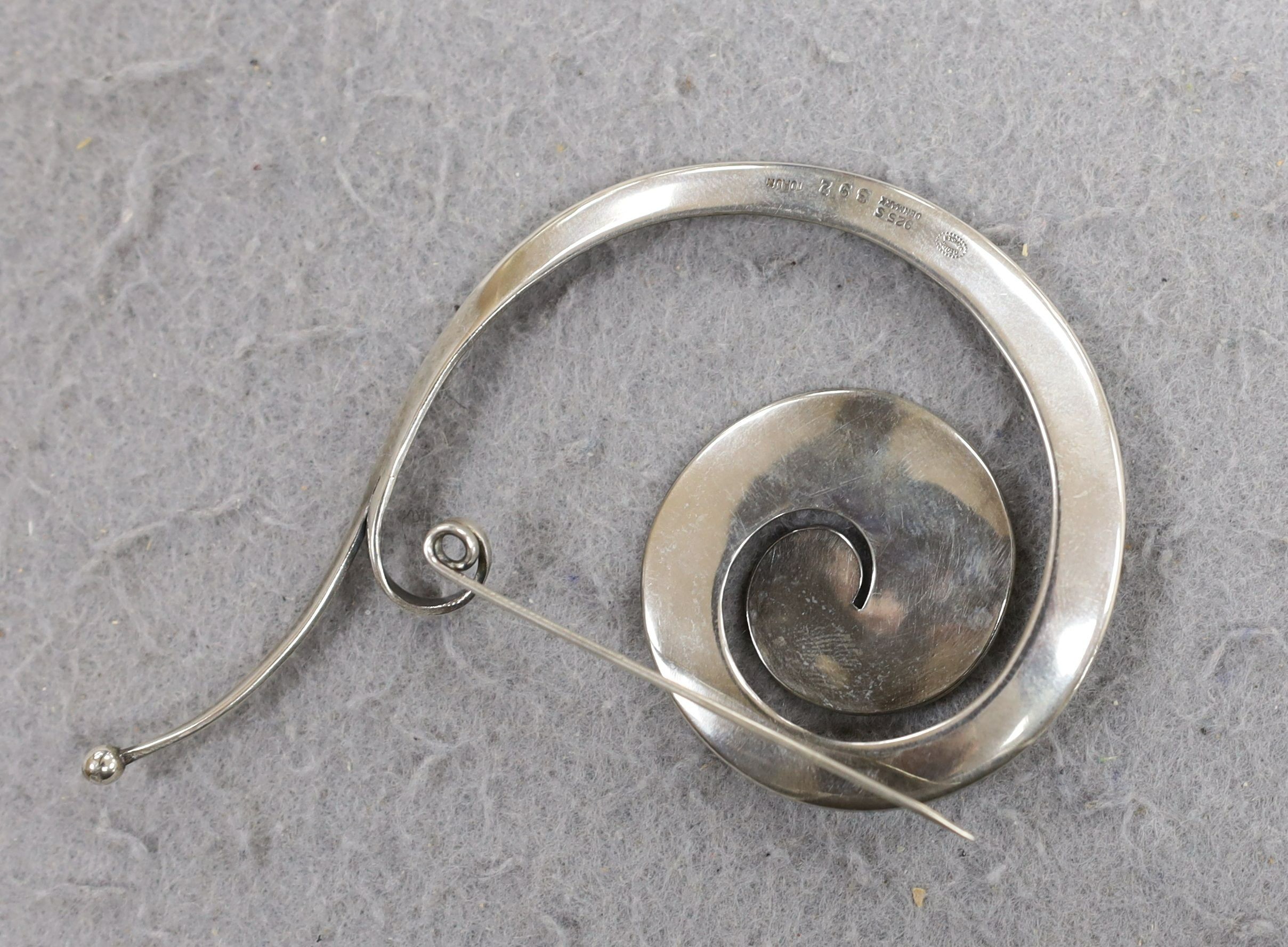 A Vivianna Torun for Georg Jensen sterling silver scroll brooch